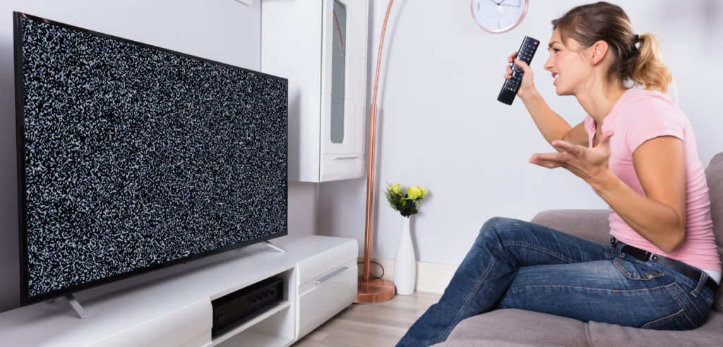 woman upset with tv not working